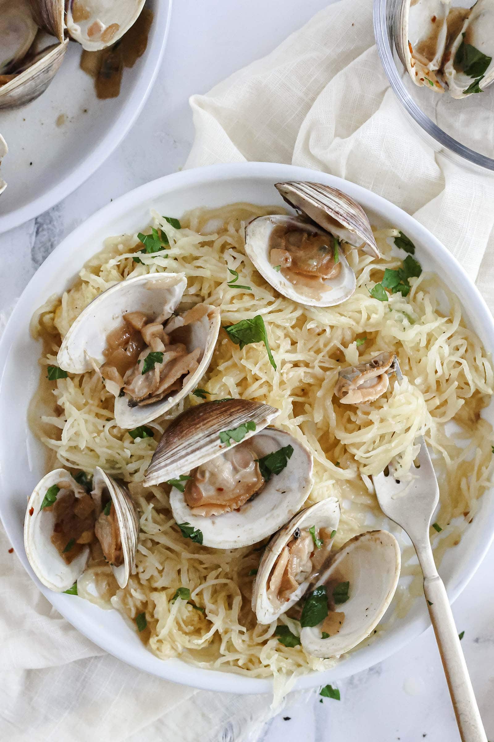 Spaghetti squash topped with steamed clams