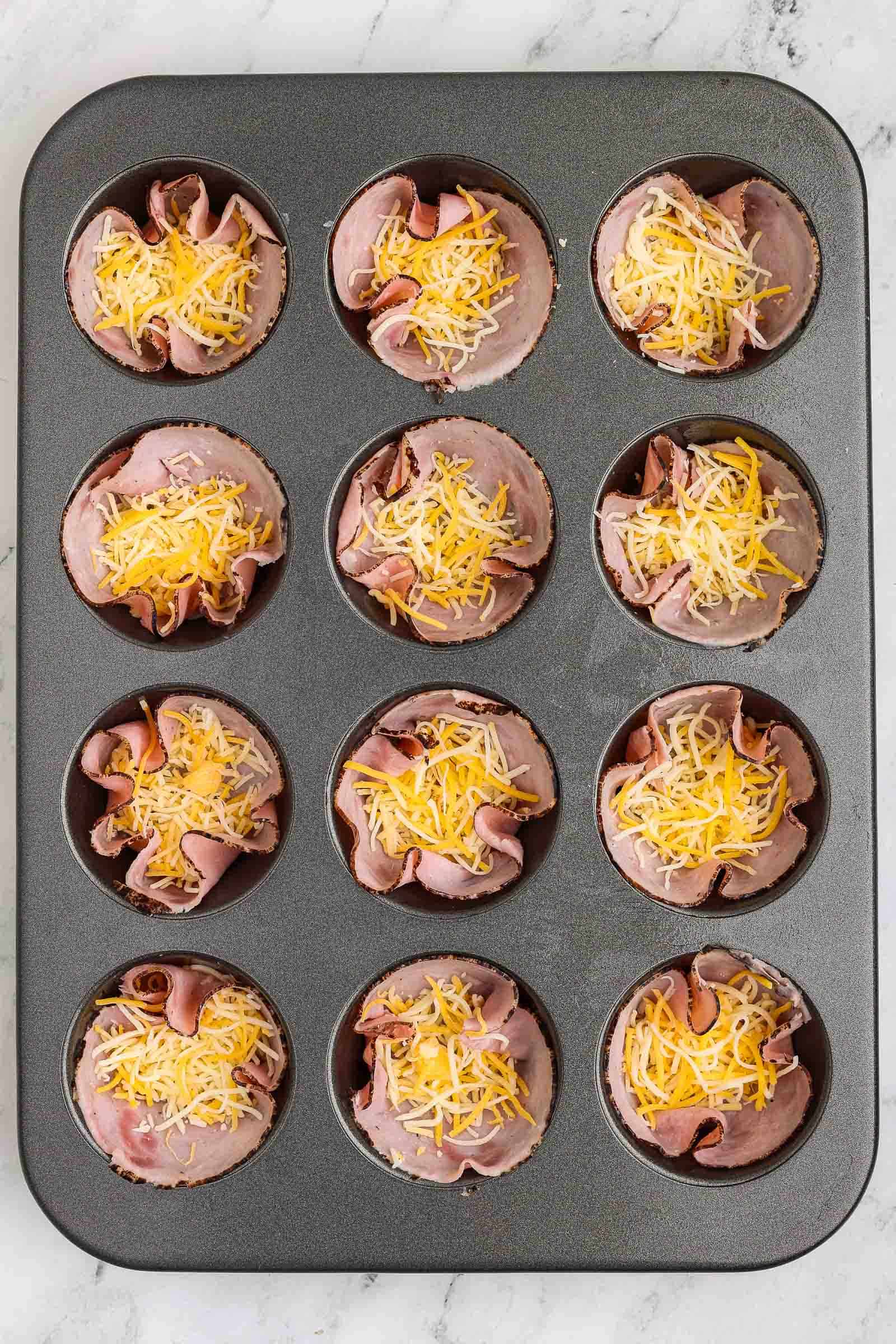 Ham and cheese in a muffin tin