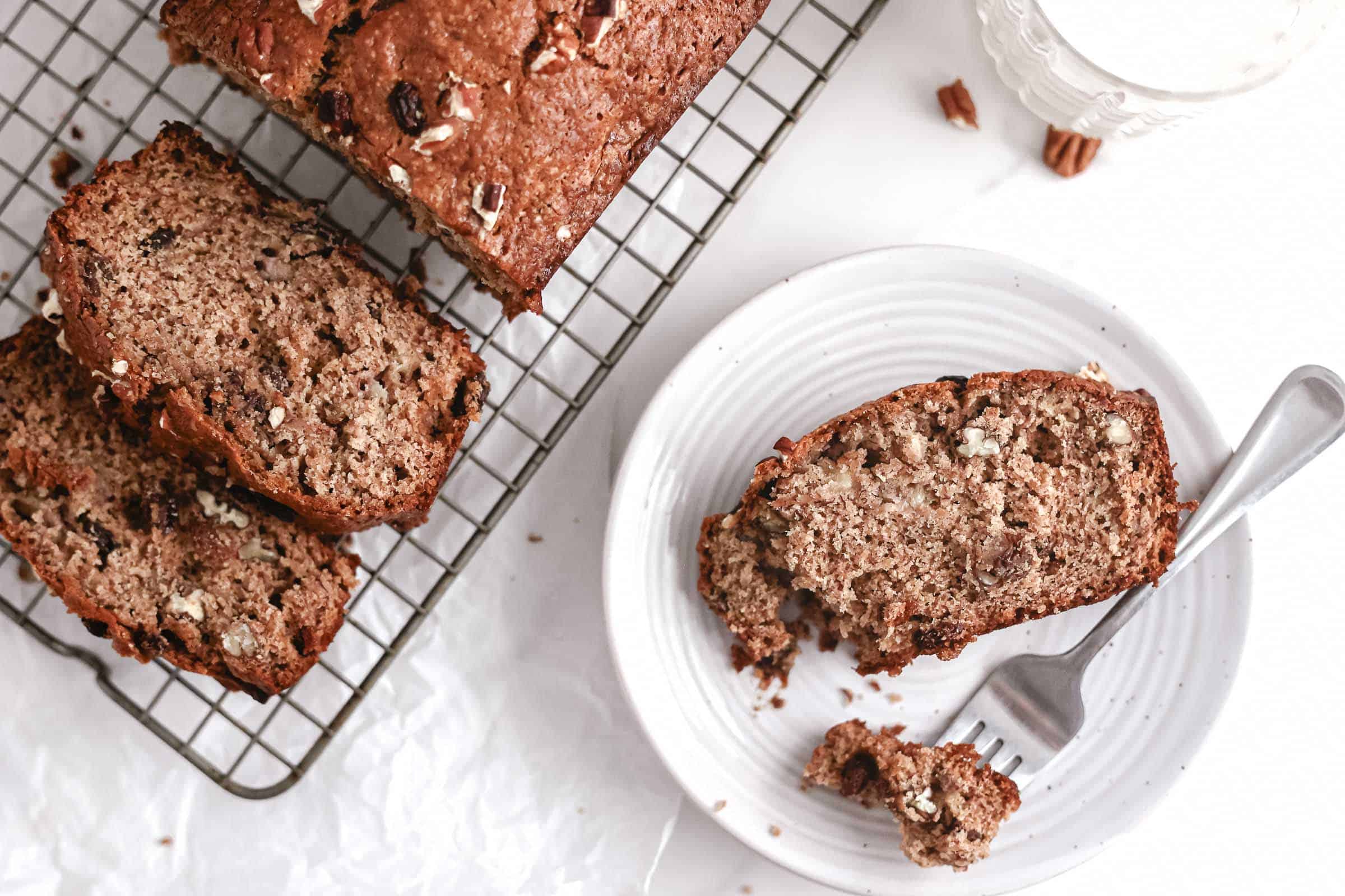 Almond Butter Banana Bread sliced on plate.