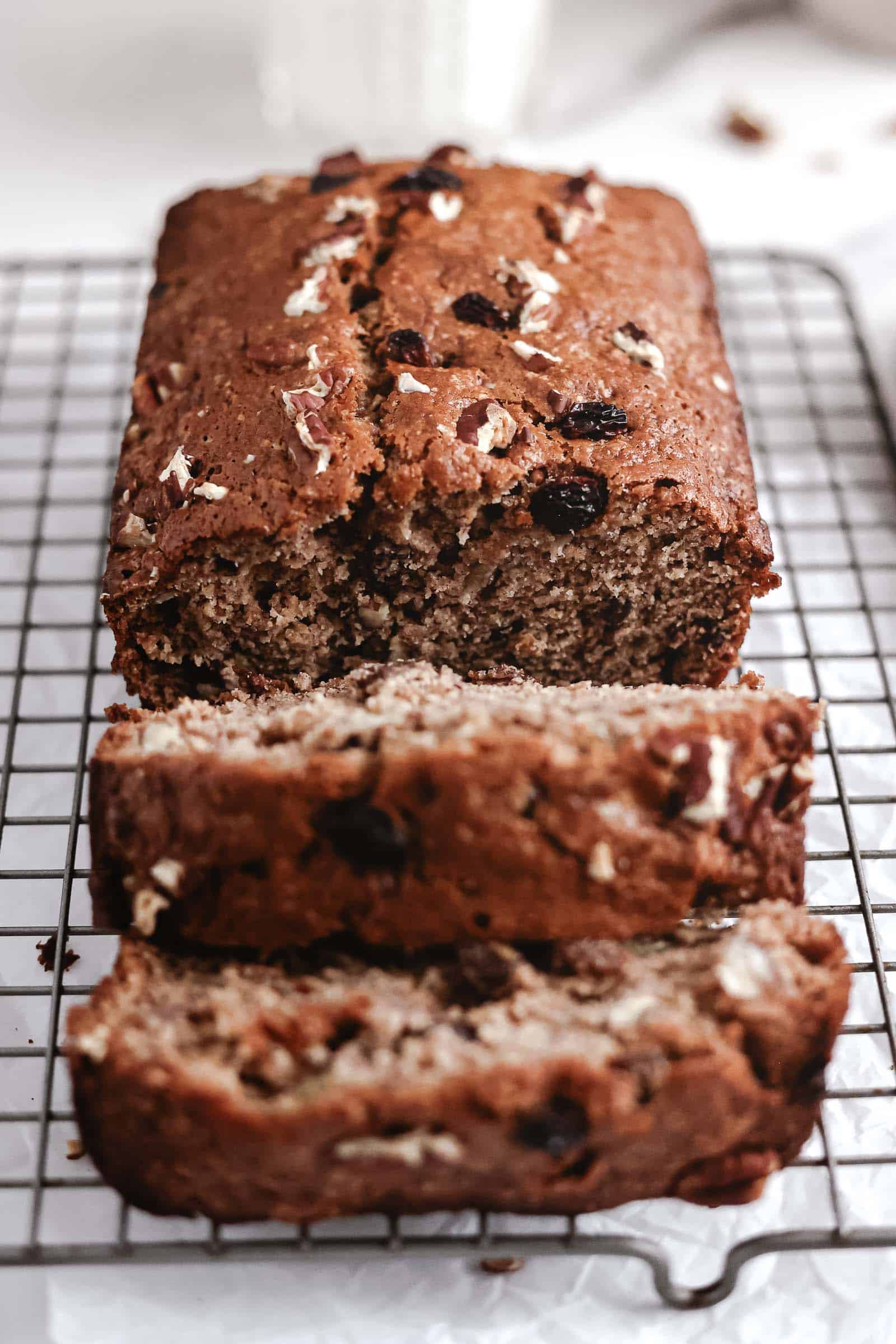Almond Butter Banana Bread sliced on metal rack