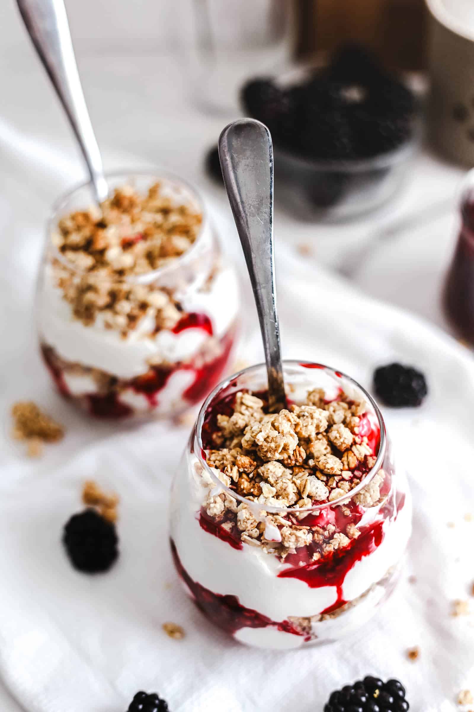 Two blackberry parfaits ready to eat.