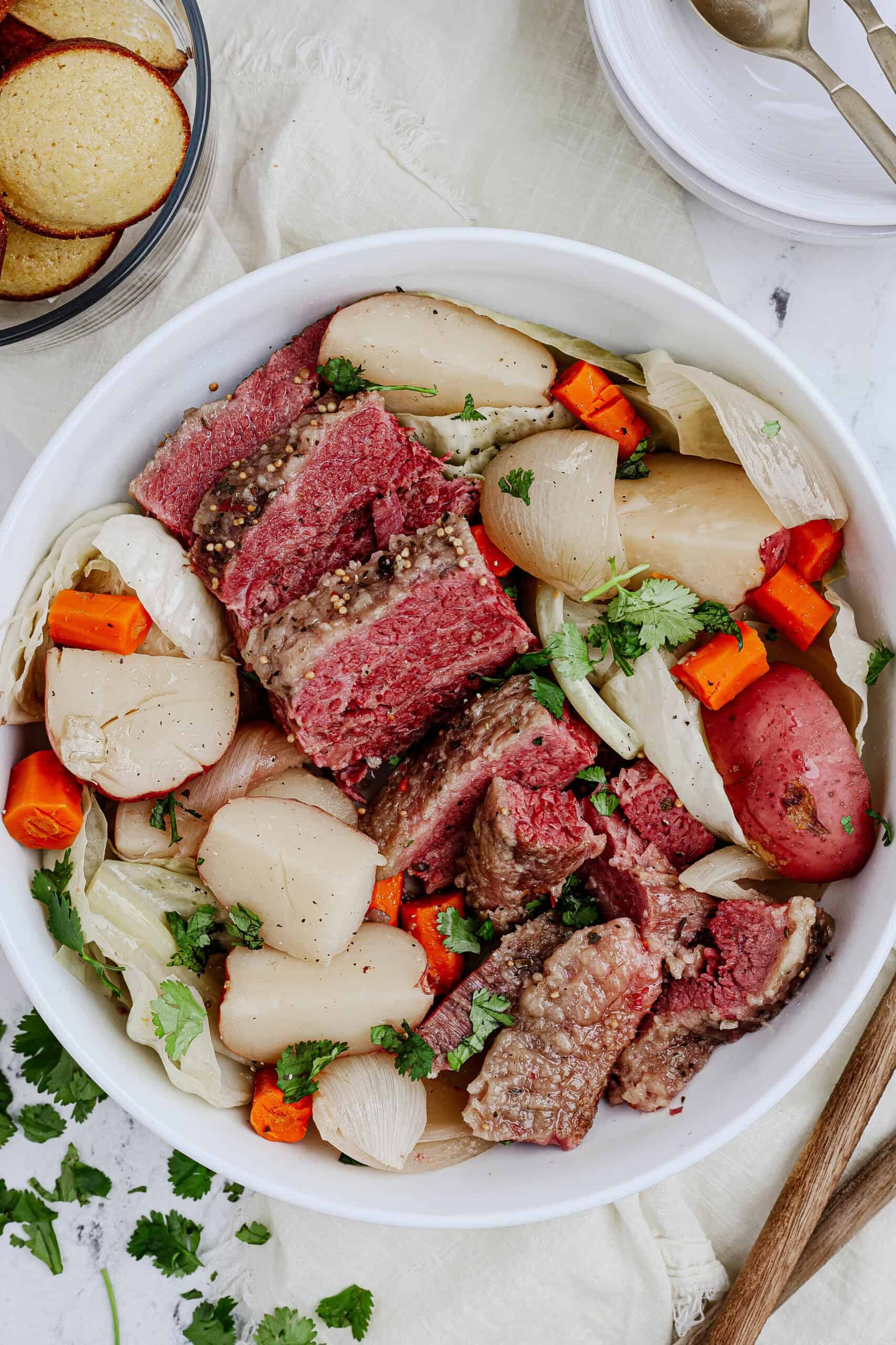 Corned beef and cabbage served on a plate.