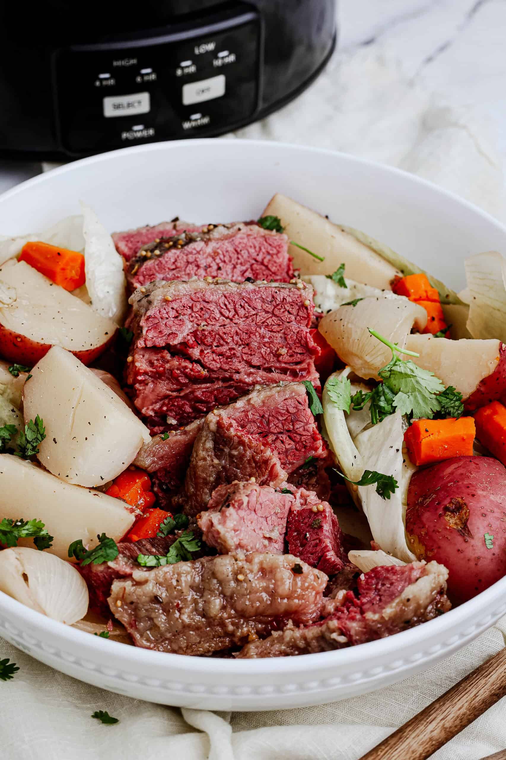 Corned beef and cabbage served on a platter.